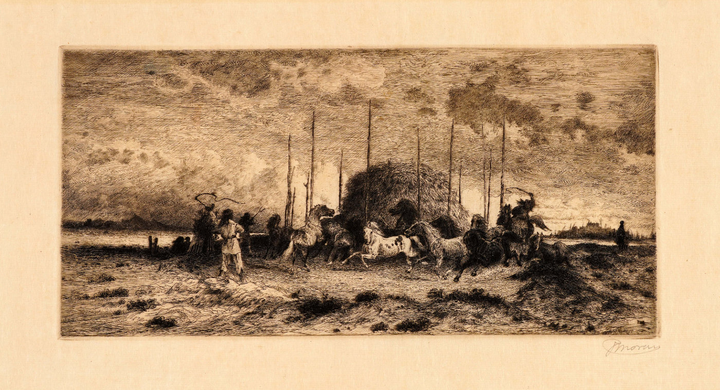 Several figures, including one cracking a whip, watch multiple horses run around a large haystack in this black and white image.